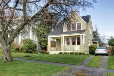 Home Exterior Painted a Natural Shade of Green.